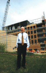 University Architect Tom Ganey stands before the future site of Eckstein Hall, one of several large construction projects currently underway