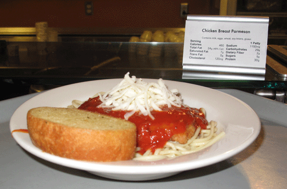 Chicken Parmesan sits in front of the nutrition information in Schroeder Hall.