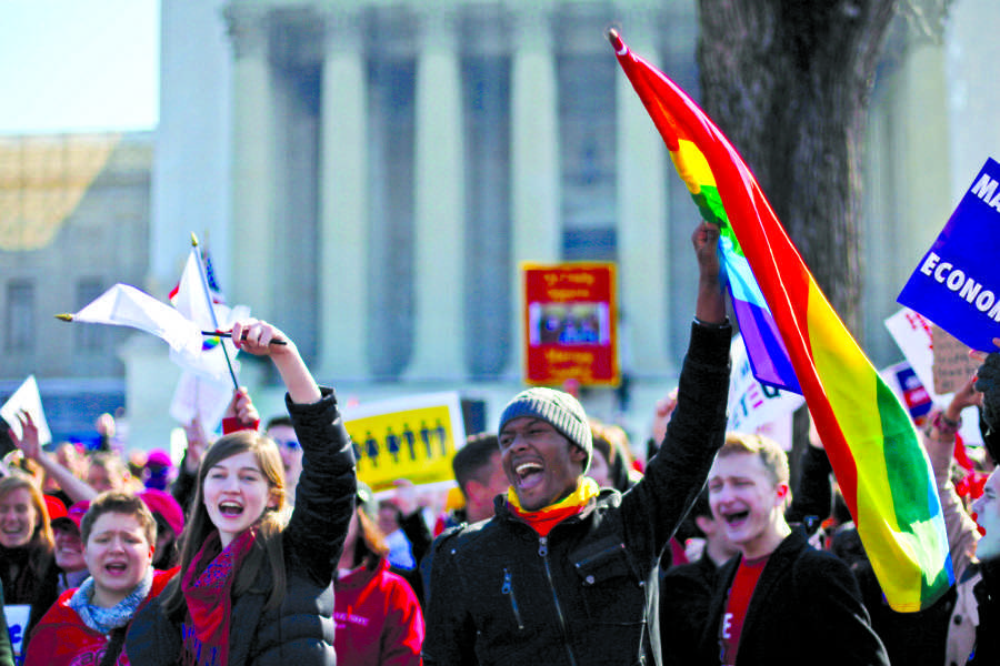 Demonstrators chant outside the Supreme Court in Washington, Tuesday, March 26, 2013, as the court heard arguments on Californias voter approved ban on same-sex marriage, Proposition 8. (AP Photo/Pablo Martinez Monsivais)