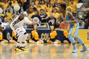 Mayos 17 second half points propel Marquette to victory