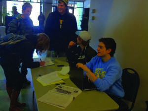 The Marquette Club Hockey team petitions to reinstate the bus services for students to attend its games. The buses were suspended following an incident involving illegal drugs last semester. Photo by Andrew Dawson.