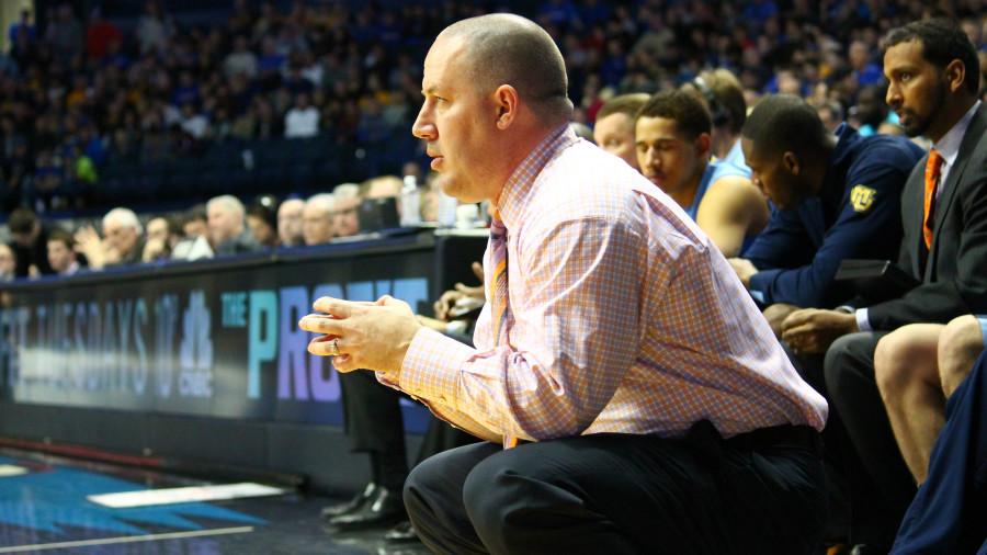 Buzz Williams looks on during the second half of Marquettes game at DePaul on 2/22/14. (Photo by Francesca Reed / francesca.reed@marquette.edu)