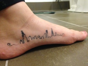 Tesia Wyszomirski shows off her love for Chicago with her tattoo. Photo by Hannah Byron/ hannah.byron@mu.edu