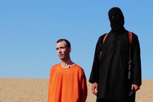 This image made from video posted on the Internet by Islamic State militants and provided by the SITE Intelligence Group, a U.S. terrorism watchdog, on Saturday, Sept. 13, 2014, purports to show British aid worker David Haines before he was beheaded.