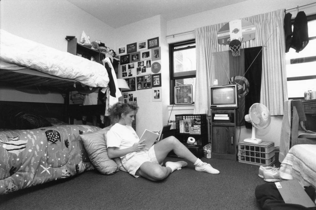 A_student_studies_while_sitting_on_the_floor_of_her_Cobeen_Hall_dorm_room