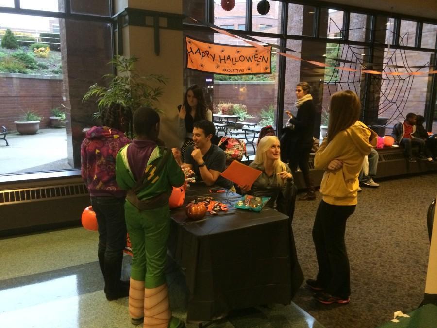 Trick-or-treaters check in at the Alumni Memorial Union for HALLoween. Photo by Joseph Cahill/joseph.cahill@marquette.edu