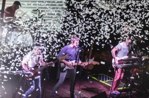From right to left: Andy Ross, Damian Kulash, Tim Nordwind, and Dan Konopka of OK Go perform amid a flurry of confetti at the Turner Hall Ballroom. Photo via facebook.com/PabstTheater