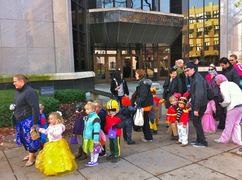 Trick-or-treaters in costume make their way past Cudahy Hall.
Photo courtesy of Mykl Novak/Tumblr.