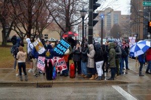 A Westboro Baptist Church picketer talks to bystanders on Wisconsin Ave. Photo by Matt Serafin/matthew.serafin@marquette.edu