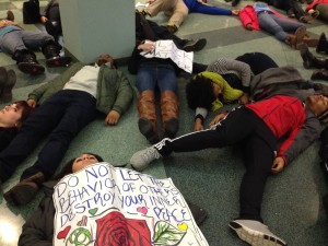 Students lay down in the Alumni Memorial Union as part of the Solidarity Die In Monday. Photo by Natalie Wickman/natalie.wickman@marquette.edu