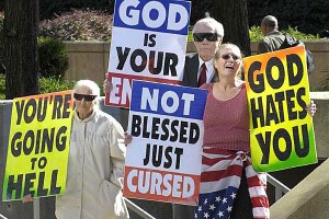 Margie M. Phelps, left, stands with her husband Pastor Fred Phelps and her daughter Margie J. Phelps during a demonstration outside the federal courthouse in Baltimore, Maryland, Wednesday, Oct. 31, 2007.  Photo by Jed Kirschbaum, Associated   Press.