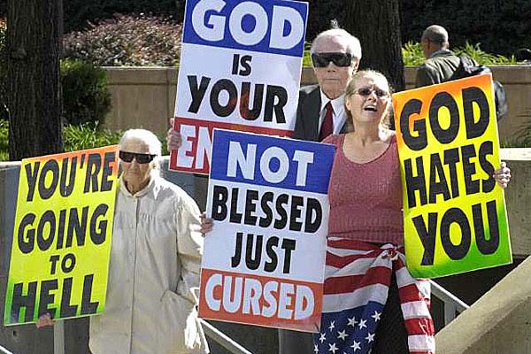 Margie M. Phelps, left, stands with her husband Pastor Fred Phelps and her daughter Margie J. Phelps during a demonstration outside the federal courthouse in Baltimore, Maryland, Wednesday, Oct. 31, 2007.  Photo by Jed Kirschbaum, Associated   Press.