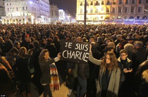 Demonstrators in Paris show support for victims of the attack on Charlie Hedbo. Photo courtesy of Associated Press