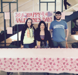 Patricia Marquart poses with students at her last Photo by Thomas Salinas ? special to the Tribune