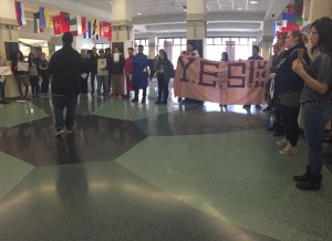 Rally members chant in the Alumni Memorial Union. Photo Nicki Perry /nicolette.perry@marquette.edu