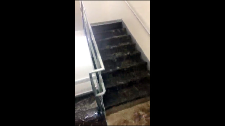 A Snapchat image of the flooding in the Schroeder Hall stairwell. Wire stock photo.