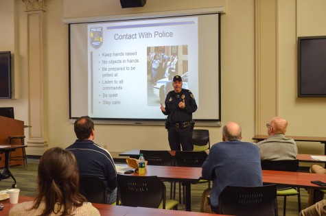 MUPD Chief Jeff Kranz conducts an active shooter training for College of Communication faculty and staff. Photo by Matthew Serafin /matthew.serafin@marquette.edu