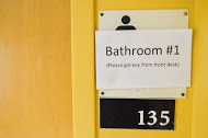 Temporary gender-neutral bathroom sign in McCormick Hall. Photo by Matthew Serafin /matthew.serafin@marquette.edu