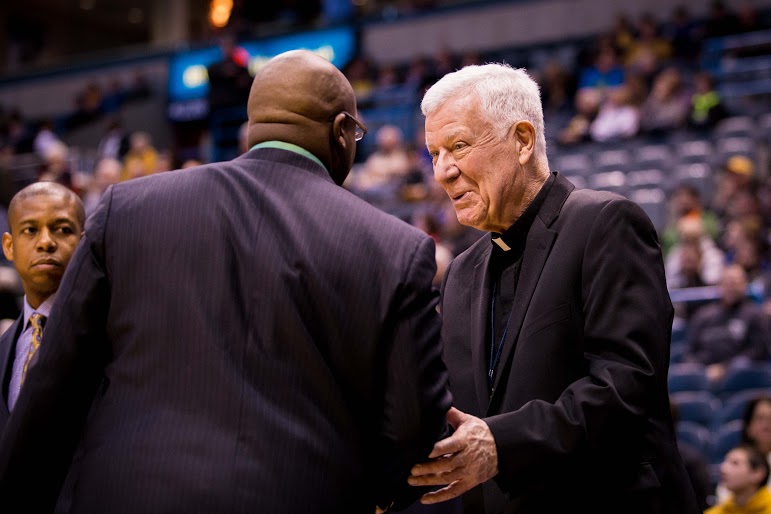 Rev. John Laurance typically arrives an hour and a half before home games to watch shoot around and interact with the Marquette community. Photo by Ben Erickson/benjamin.a.erickson@marquette.edu