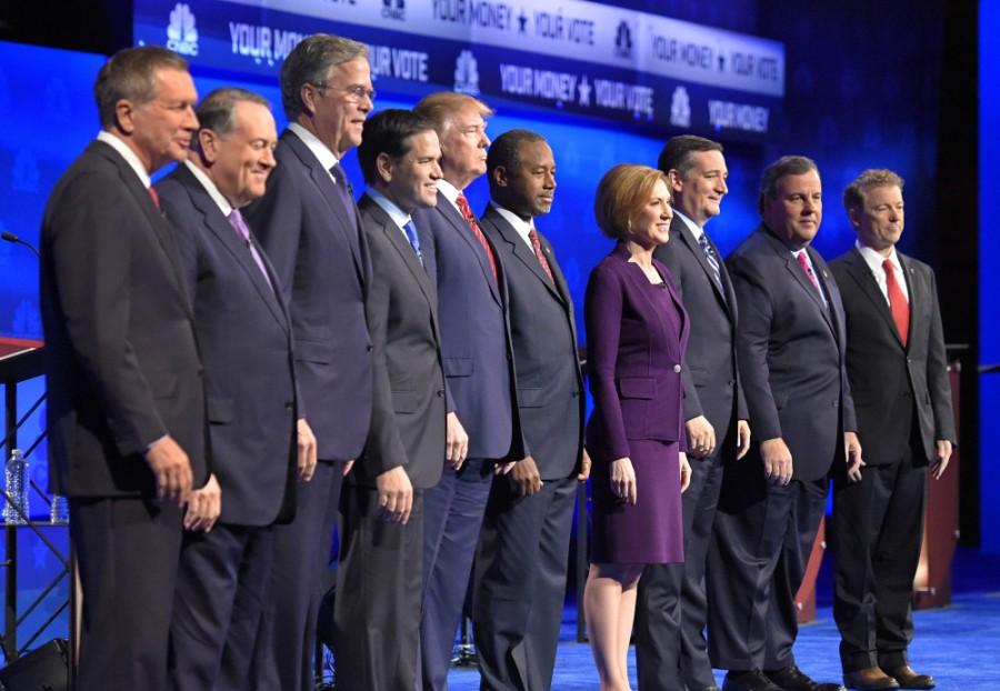 Republican presidential candidates, from left, John Kasich, Mike Huckabee, Jeb Bush, Marco Rubio, Donald Trump, Ben Carson, Carly Fiorina, Ted Cruz, Chris Christie, and Rand Paul take the stage during the CNBC Republican presidential debate at the University of Colorado, Wednesday, Oct. 28, 2015, in Boulder, Colo. (AP Photo/Mark J. Terrill) ORG XMIT: OTK