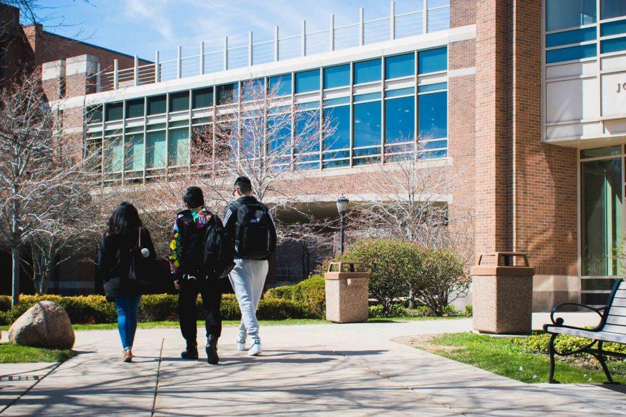 Students walking near the library.