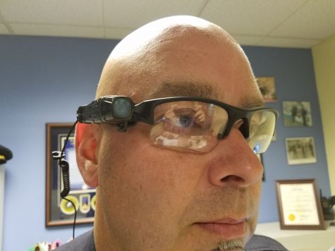 The Axon Flex body camera is worn on an officer's eyewear.