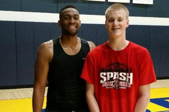 Joey Hauser stands with Milwaukee Bucks forward Jabari Parker in the Al McGuire Center.