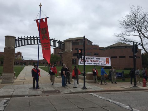 The American Society for the Defense of Tradition, Family and Property brought bagpipes as part of their protest to try and gain student attention. Photo by McKenna Oxenden/mckenna.oxenden@marquette.edu