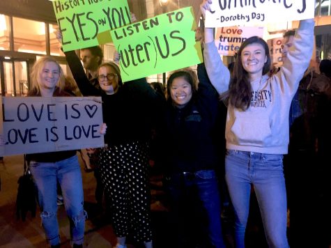 Left to right: Marquette students Lili Erickson, Hannah Seeman, Melissa Alburo, Olivia attend anti-Trump protest in Milwaukee Thursday night. *Olivia did not wish to give her last name
