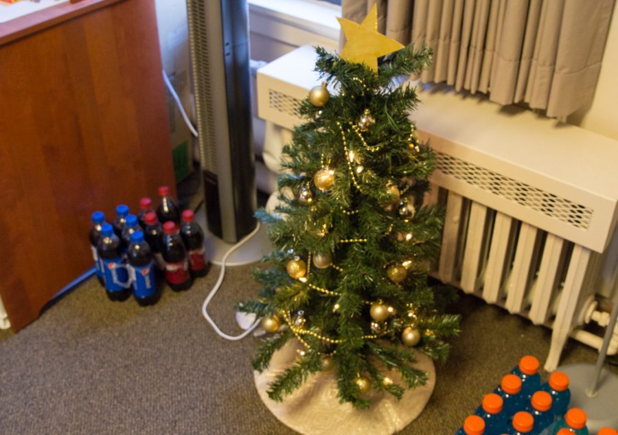 Some Marquette students, especially freshmen far away from home, are going the extra mile to add some holiday cheer to their white walled dorm rooms. 