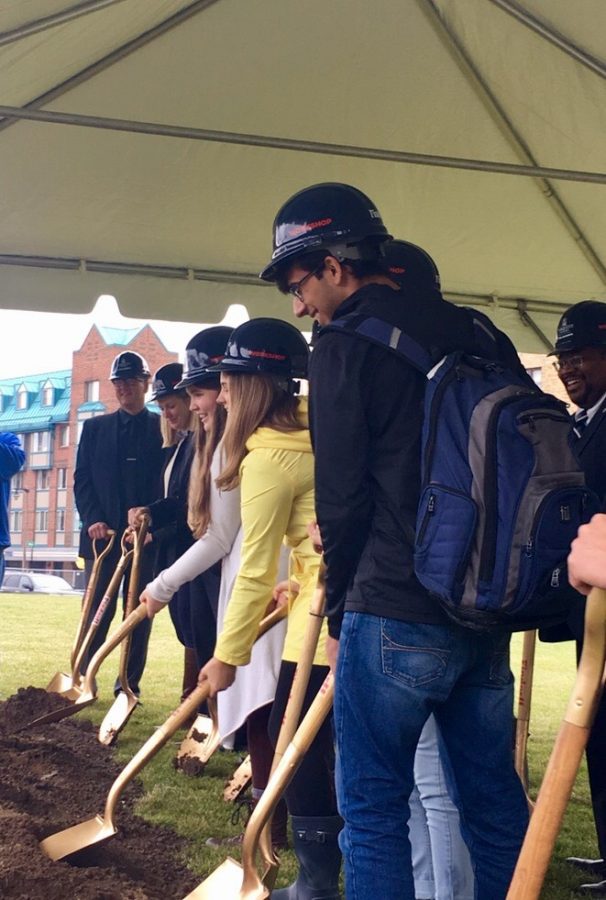 Students take part in groundbreaking ceremony in the field in front of O’Donnell Hall 