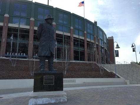 A statue of famous Packers head coach Vince Lombardi stands outside Lambeau Field in Carolines hometown of Green Bay.