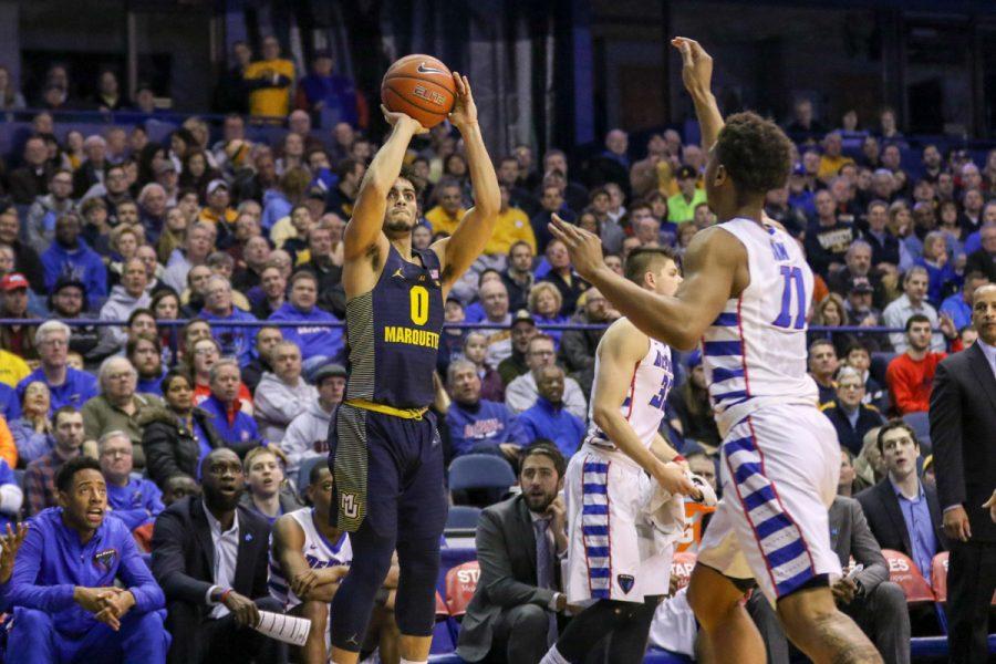 Markus Howard shoots a 3-pointer during Marquette's game against DePaul Saturday.