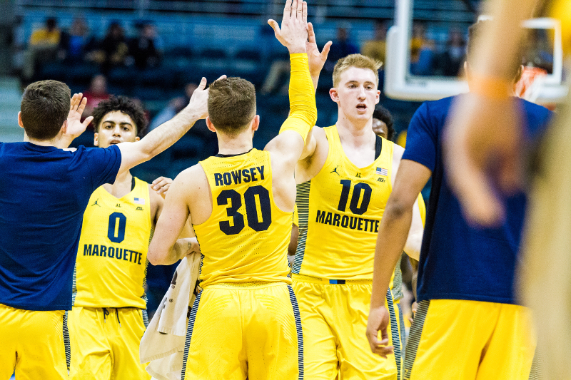 Marquette celebrates by the bench during a game against St. Johns this season.