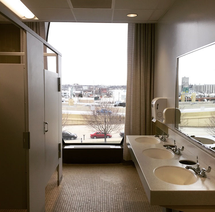 The massive window in the women’s restroom on Lalumieres third floor shows everything South Milwaukee has to offer. Photo by Yue Yin.