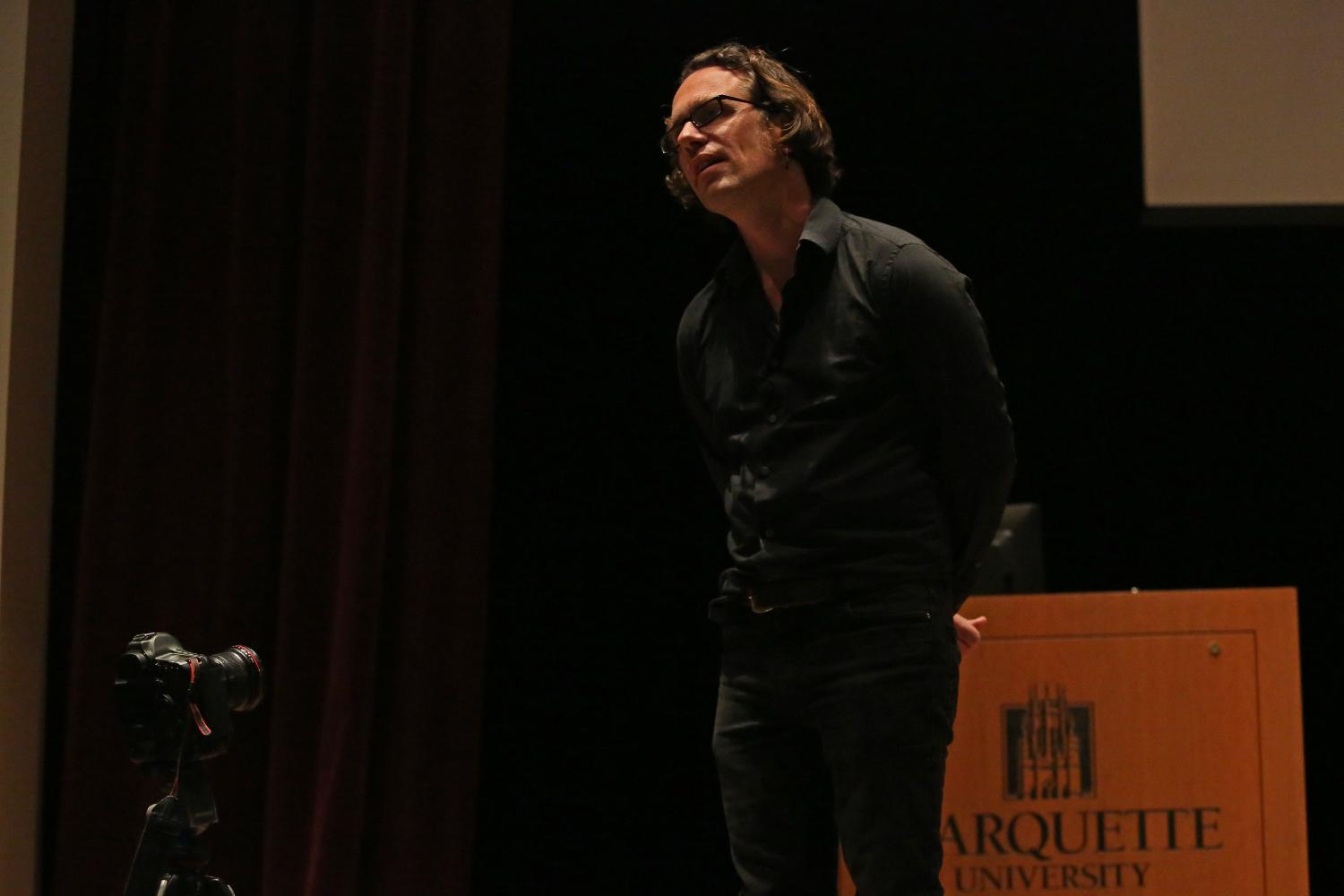 Christian Ziegler speaking at Marquette. 
