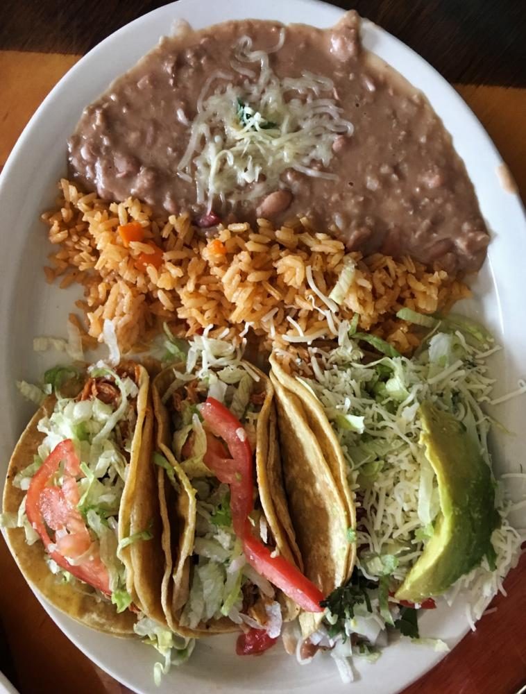 Three tacos with rice & beans