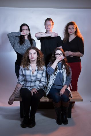 Members of the cast of Student Body posing with the most powerful quotes in the play.