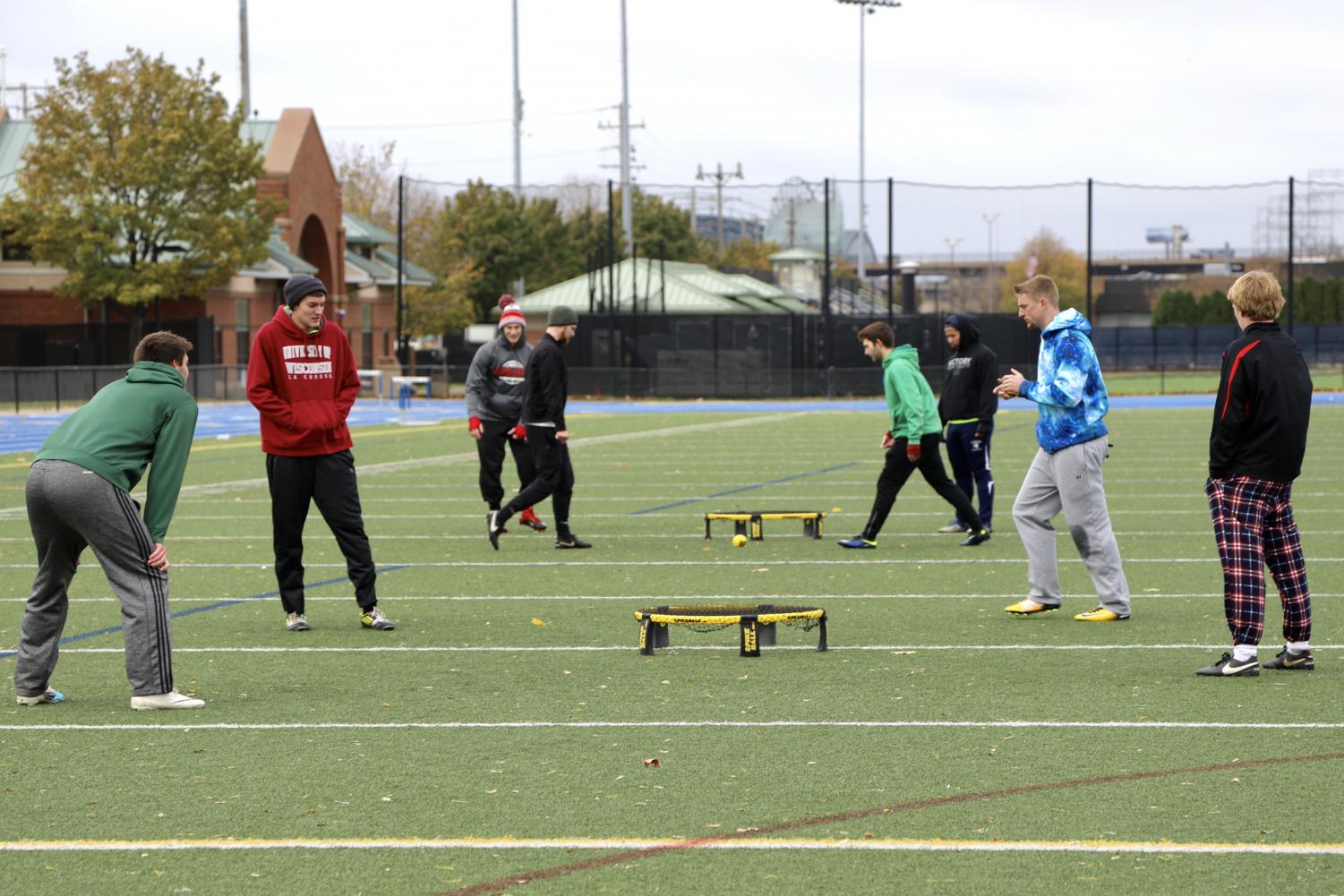 Teams from around Milwaukee compete in Marquette's inaugural spikeball tournament at Valley Fields.