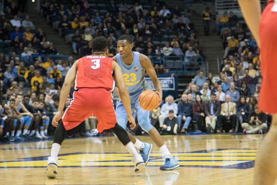 Freshman Jamal Cain takes on Georgias Juwan Parker. Cain had eight points on three-of-four shooting.