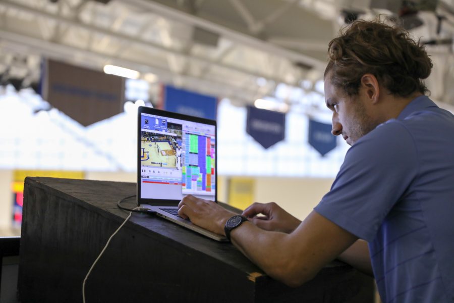 Video coordinator Rob Carver works in the upper levels of the Bradley Center. (Photo by Maggie Bean via Marquette Athletics.)