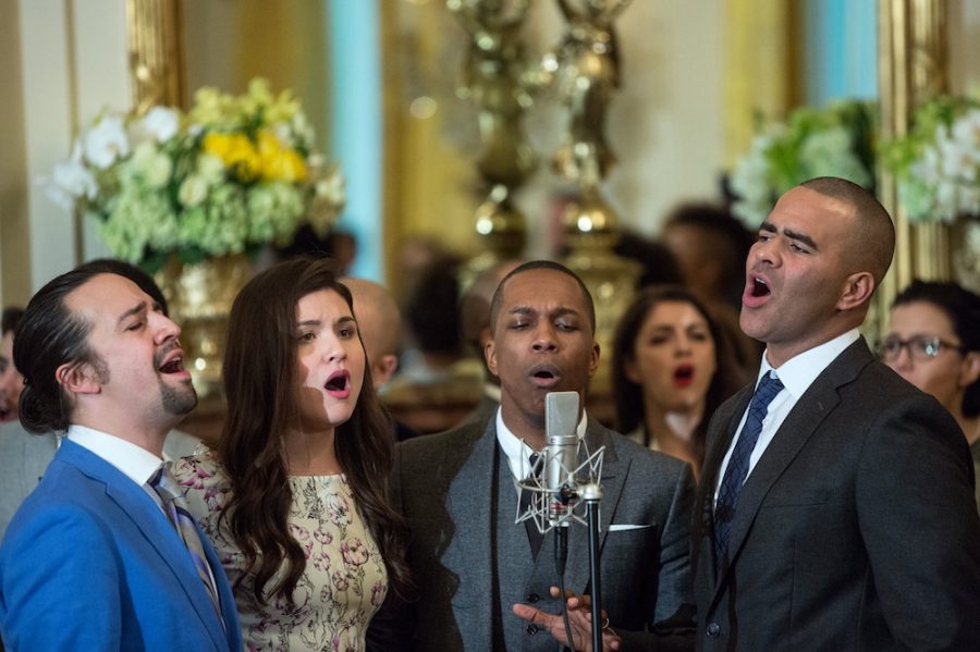 Cast members from Hamilton engage in a group song at the White House.