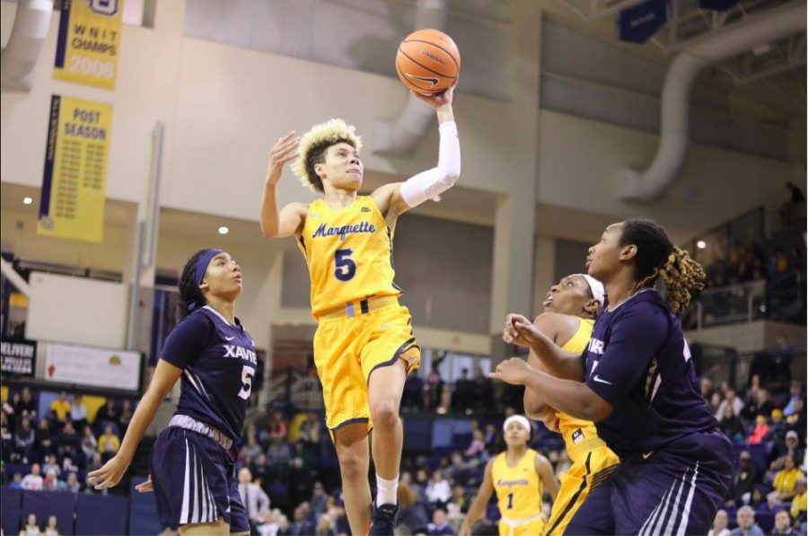 Natisha Hiedeman attempts a jump shot against Xavier Sunday afternoon. The Golden Eagles improved to 7-0 in the BIG EAST. (Photo by Maggie Bean and courtesy of Marquette Athletics.)