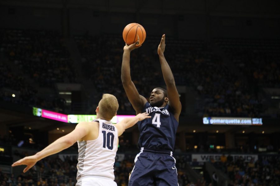 Villanovas Eric Paschall rises up for a jumper over Marquettes Sam Hauser.