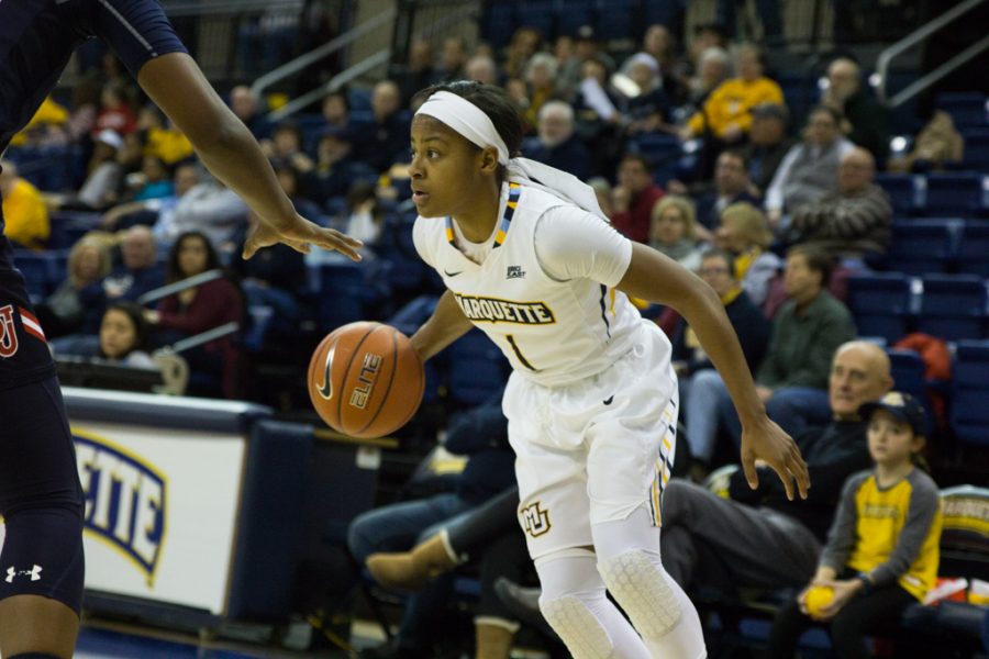 Junior Danielle King scored 11 points in Marquettes victory over St. Johns to clinch a share of the BIG EAST womens basketball title.