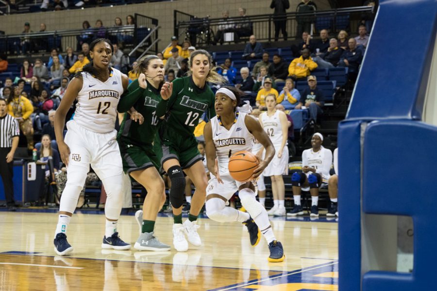 Danielle King drives the baseline against Loyola Maryland.