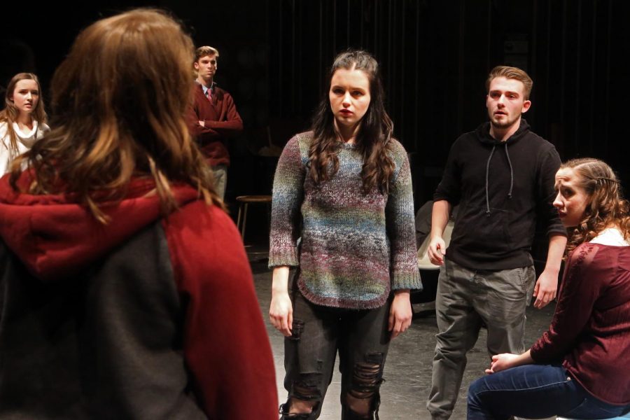 Characters Daisy (Annie Kefalas), Rob (Nicholas Cordonnier), and Maggie (Raven Ringe) debate about what to do with video footage of a sexual assault in Marquette Theatres Student Body.