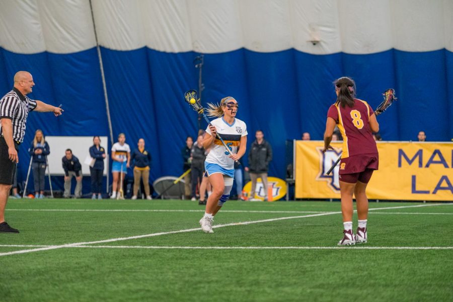 Lindsey Willcocks (right) brings up the ball against Central Michigan. The Golden Eagles went 2-0 this weekend.