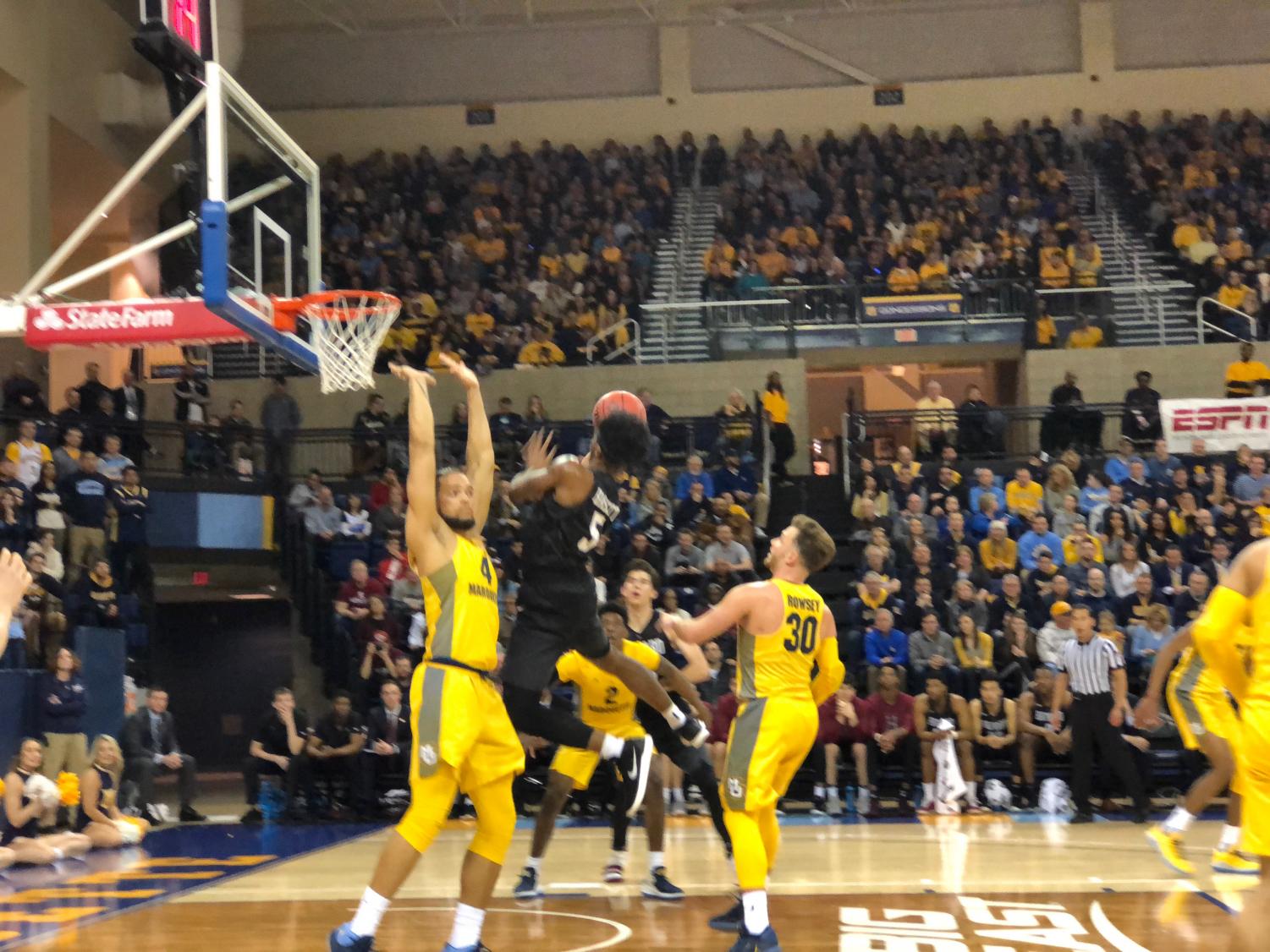 Marquette blanketed Harvard all night, forcing 22 turnovers.