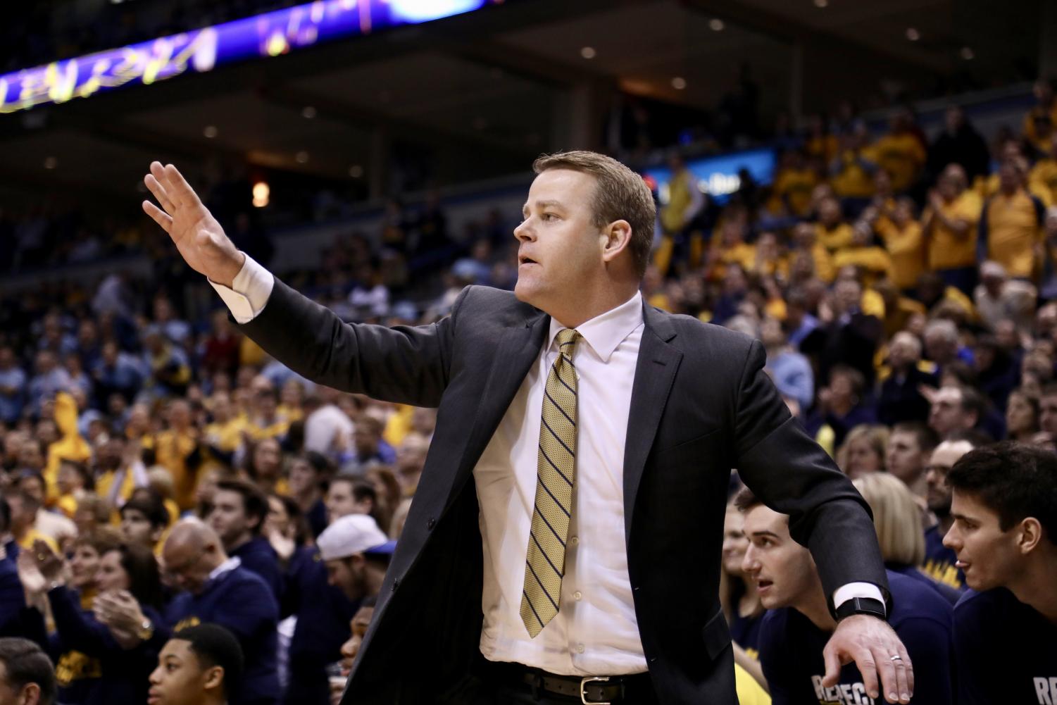 Steve Wojciechowski has a close relationship with Harvard head coach Tommy Amaker.